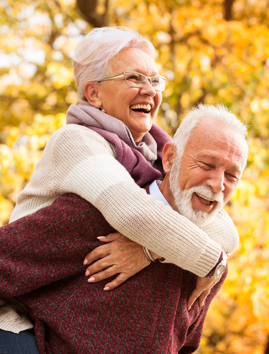Senior couple enjoying Fall weather