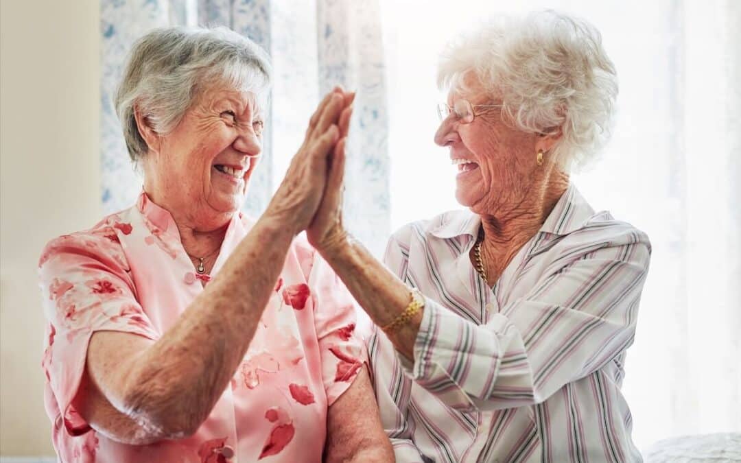 Happy, love and senior women with a high five for care, retirement support and happiness.